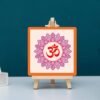 Half Engineer Om Printed MDF Table Top with Wooden Easel Stand - 4x6 inches. A spiritual decor piece featuring a vibrant Om symbol, perfect for temple decoration and thoughtful gifting for friends and family.